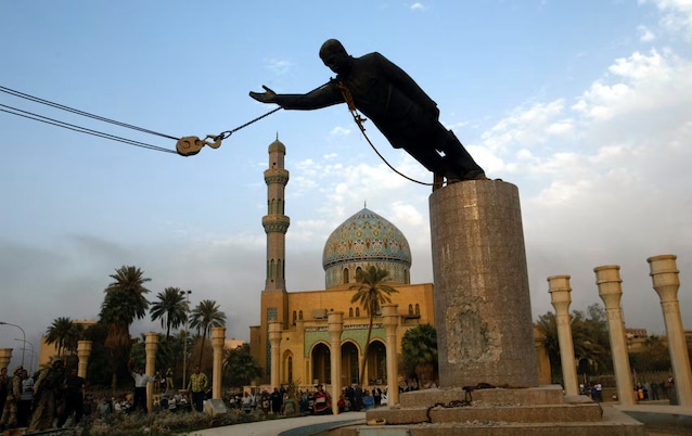 Saddam Hussein statue shot down in Iraq in 2003