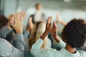 The meaning and origins of applause, the gesture of clapping
