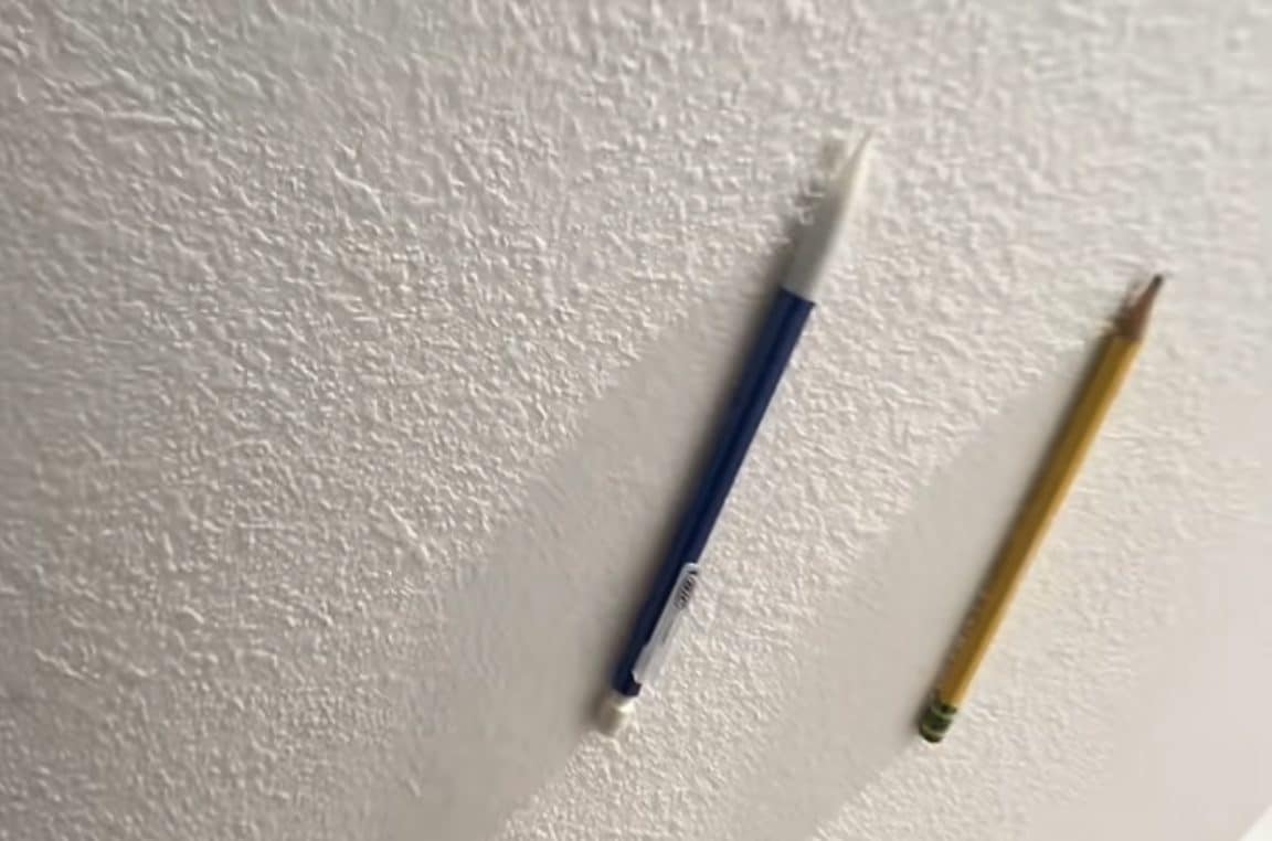 The trick of making objects hang on the wall with friction really works - here's why