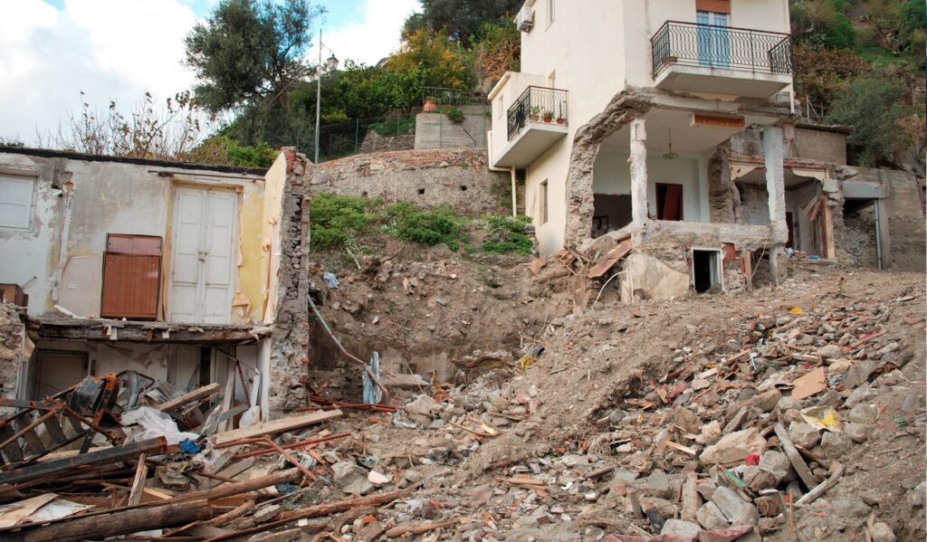 What is a landslide and how is it studied from a geotechnical point of view