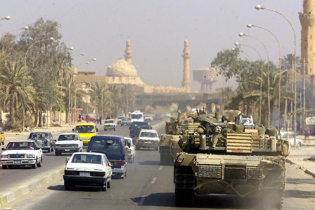 American vehicles in Baghdad (credit Wikimedia Commons)