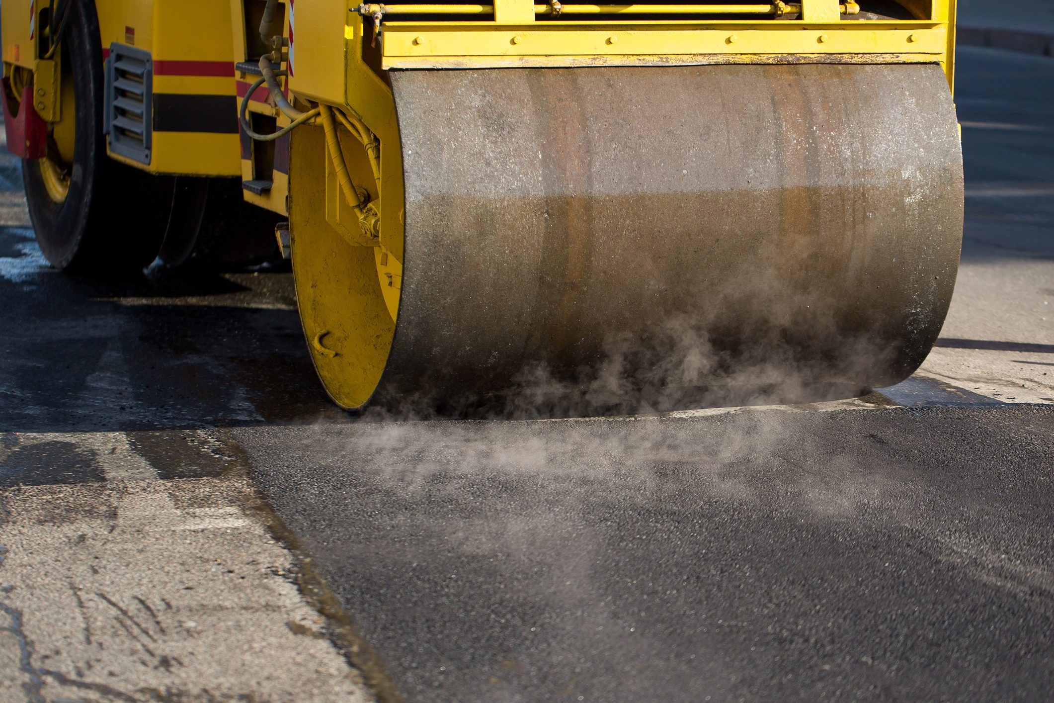 Because new roads have that distinctive asphalt smell: the chemistry of the bitumen and the heat