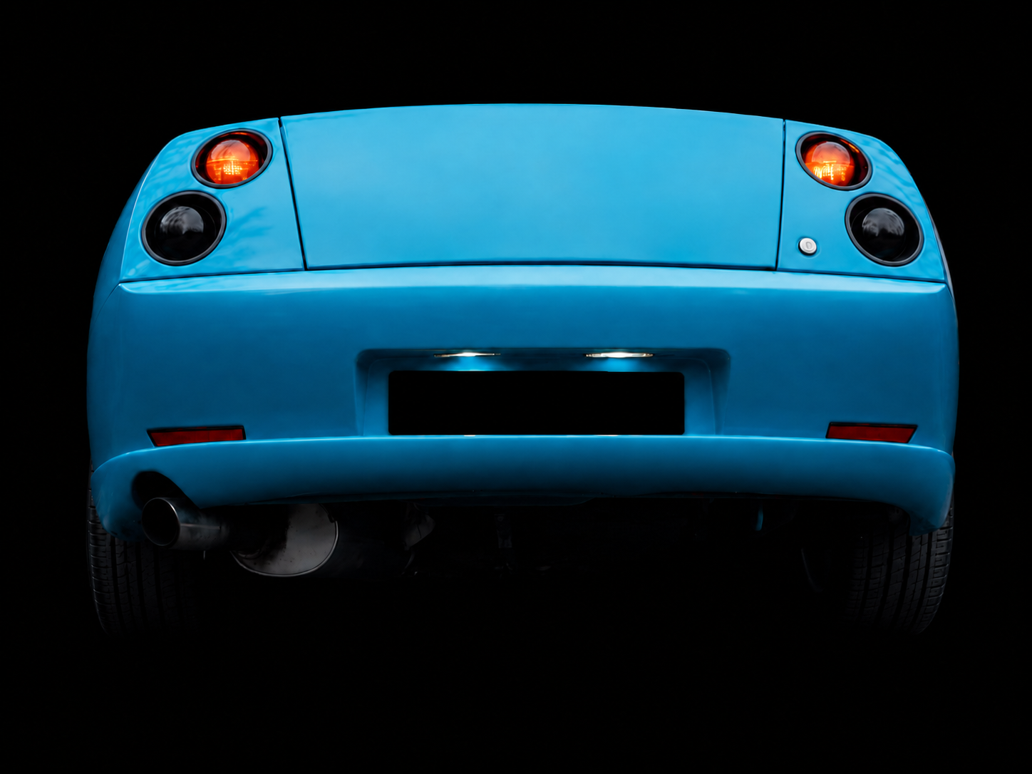 The rear and headlights of the 1994 Fiat Coupé (YouTube photo) The rear and headlights of the 1994 Fiat Coupé (YouTube photo)