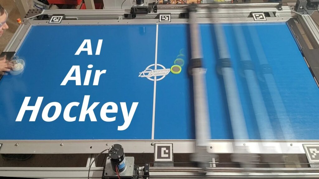 An unbeatable air hockey robot challenges humans in real life: how AI learned to play