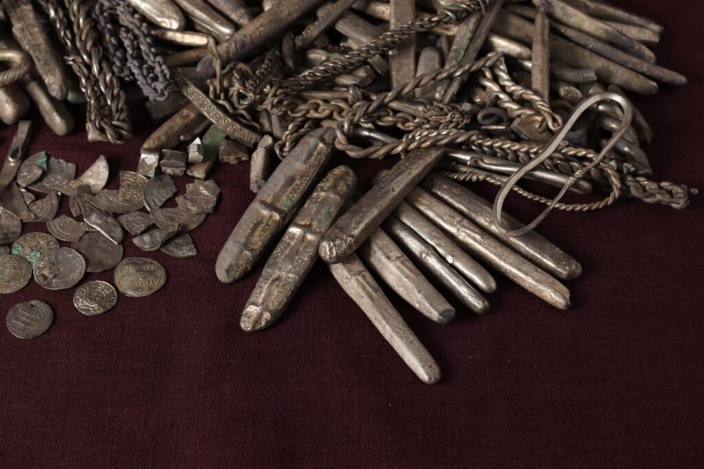 The largest 10th century Viking silver treasure discovered in Denmark in a private garden: it weighs 18kg